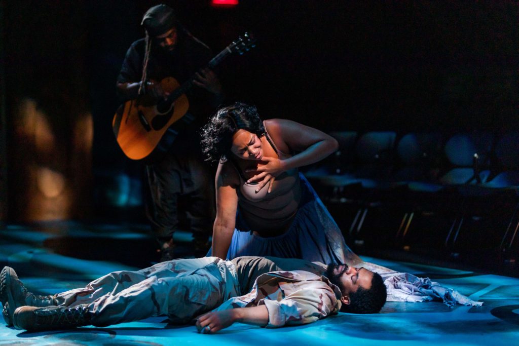 Ramona Lisa Alexander (Circe) and Brandon G. Green (Ulysses Lincoln) with Akili Jamal Haynes in the background. Photo: Maggie Hall.