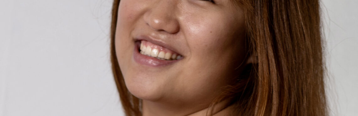 Headshot of Caron Sujean Kim