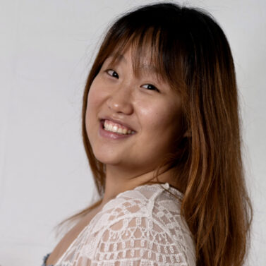 Headshot of Caron Sujean Kim